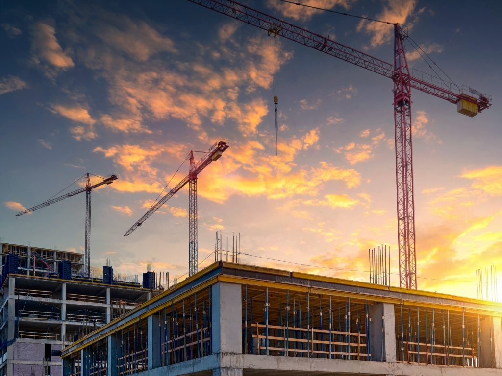 Construction worker injured after falling through incomplete scaffold — scaffold planks failing on building site